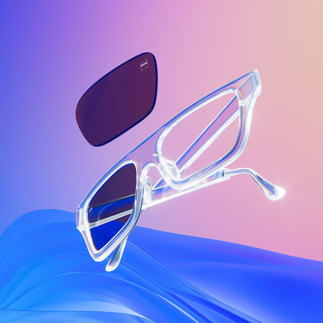Ilustração 3D gerada por computador de uma armação de óculos transparente com lentes coloridas.