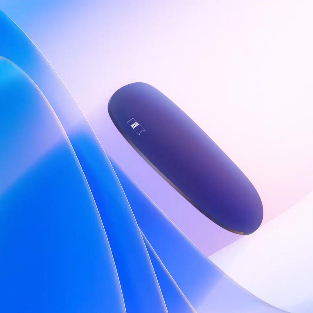 Ilustração 3D gerada por computador de uma lente colorida a flutuar em direção a uma fonte de luz, bloqueando eficazmente raios UV nocivos.