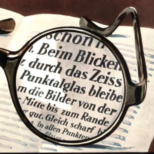 Imagem de um anúncio antigo das lentes ZEISS Punktal que mostra uma visão nítida em toda a superfície da lente. Em 1912, isto era revolucionário. 
