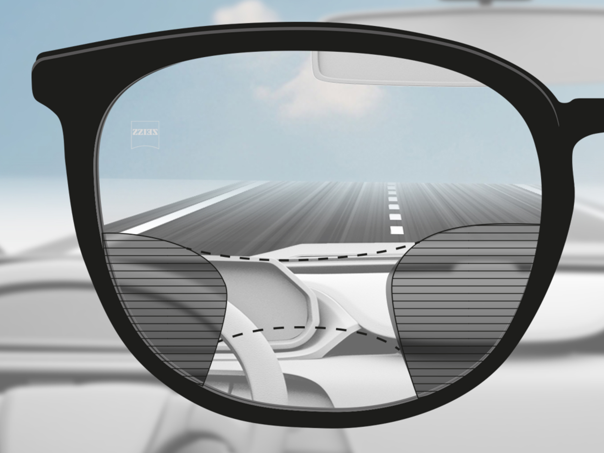 Imagem através da lente ZEISS DriveSafe Progressiva: as zonas de visão são adaptadas para que o condutor tenha uma visão nítida da estrada e do tablier.