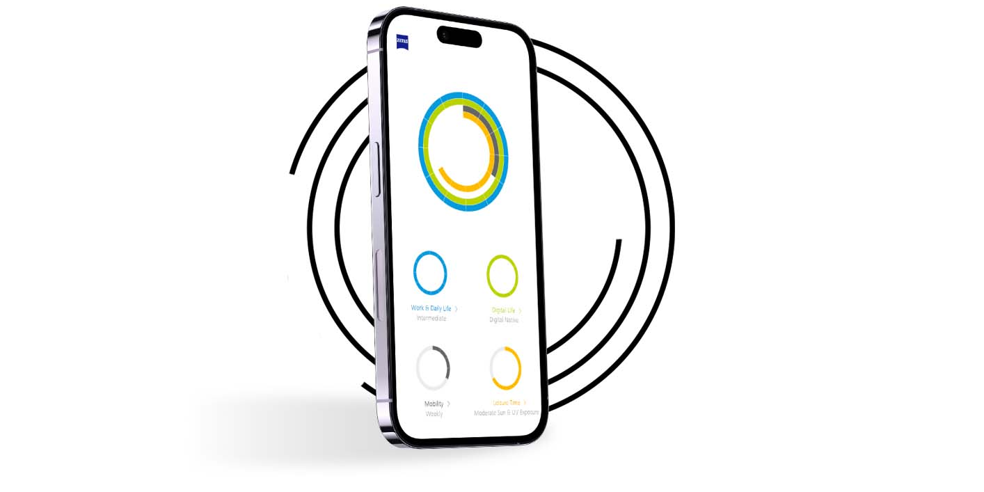 Smartphone em frente a anéis pretos mostrando o perfil de um usuário do Perfil Minha Visão com anéis de cores diferentes.