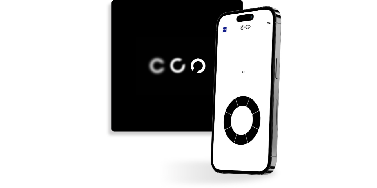 Um smartphone com um exercício do teste de visão online da ZEISS no ecrã; uma pessoa em pé à frente de um botão com quadrados pretos que mostra círculos com diferentes graus de nitidez e uma abertura virada para direcções diferentes, geralmente utilizados em testes de visão.