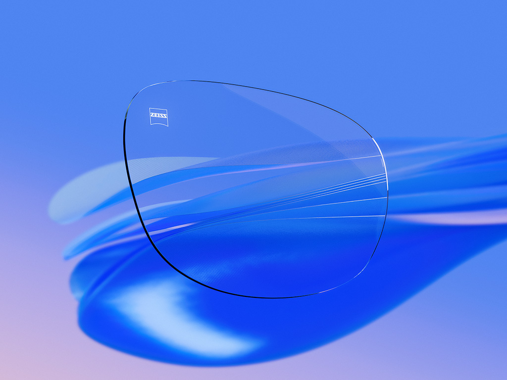 Ilustração 3D gerada por computador de uma lente oftálmica transparente com reflexos mínimos, realçando a sua excecional nitidez e qualidade óptica.