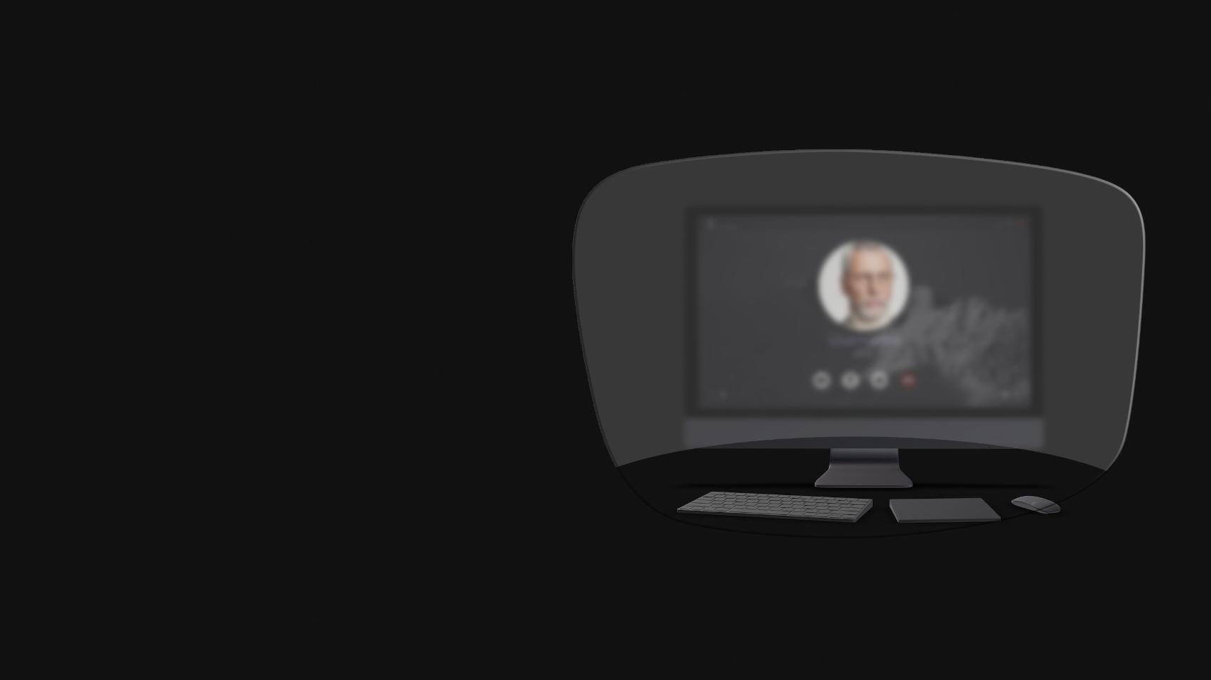 A vista de um computador de secretária, de um teclado, de um rato e de um livro através de uma ilustração esquemática de uns óculos de leitura mostra que apenas os objetos muito próximos são claramente visíveis. O ecrã do computador está desfocado.