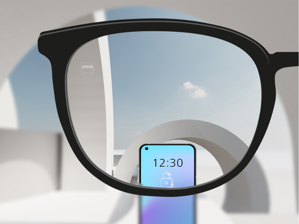 Ilustração esquemática da visão através de uma lente monofocal SmartLife Young que mostra uma visão nítida de objetos distantes e de dispositivos digitais. 
