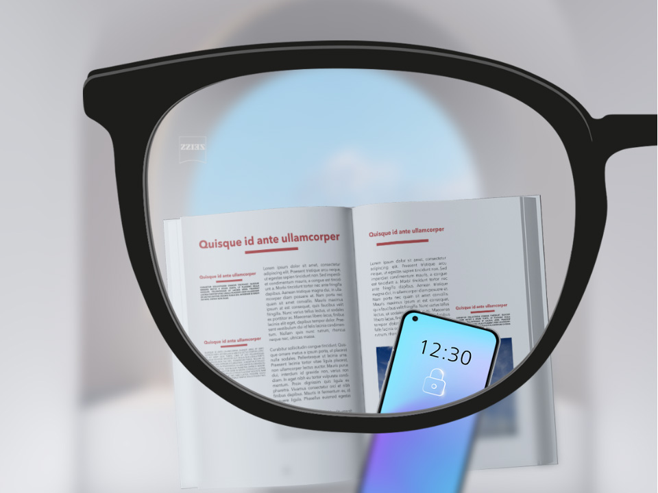 Imagem totalmente nítida de um smartphone e de um livro através da lente ZEISS SmartLife Monofocal.
